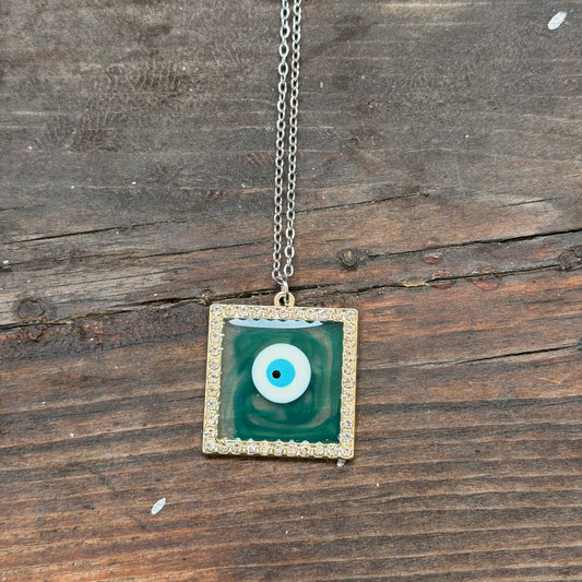 Green eye necklace