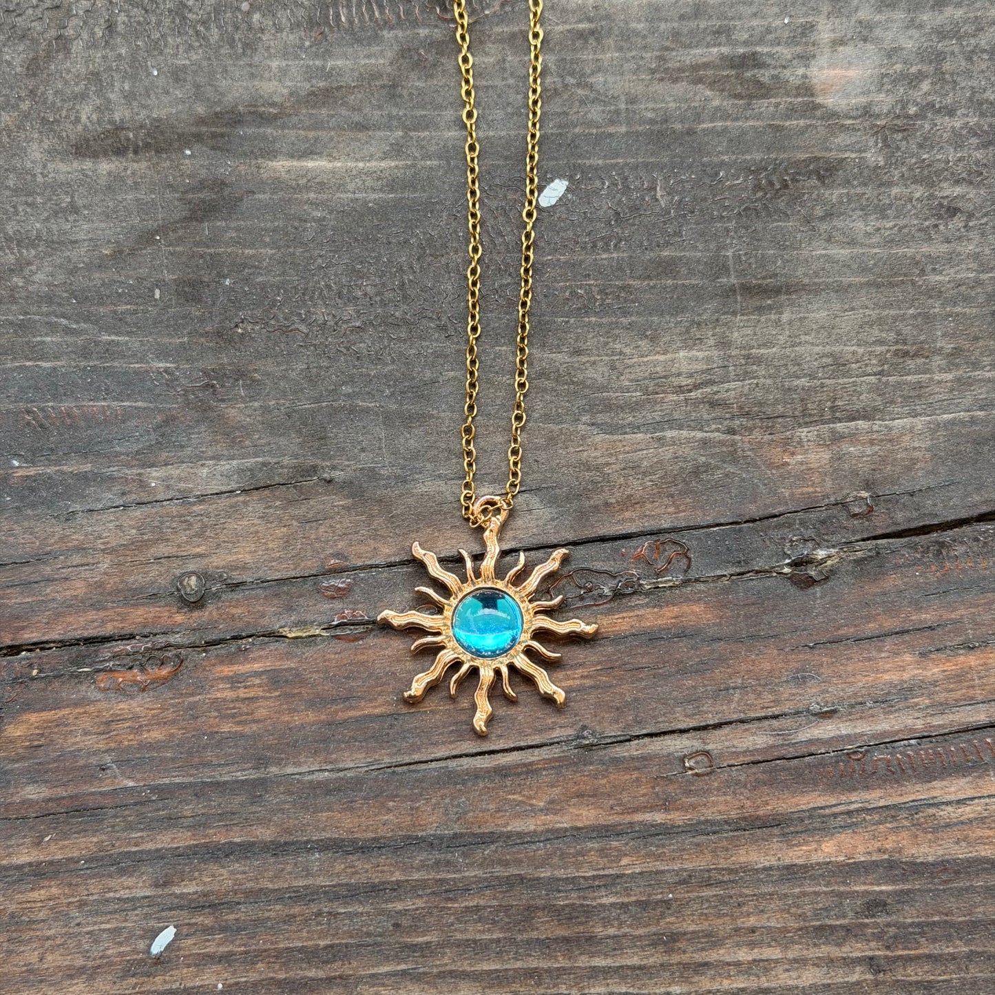 Blue sun necklace